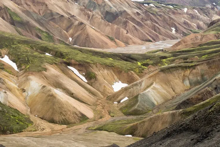 brown and green mountain range in Iceland