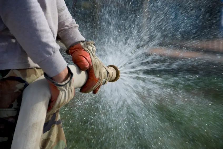 firehose shooting stream of water